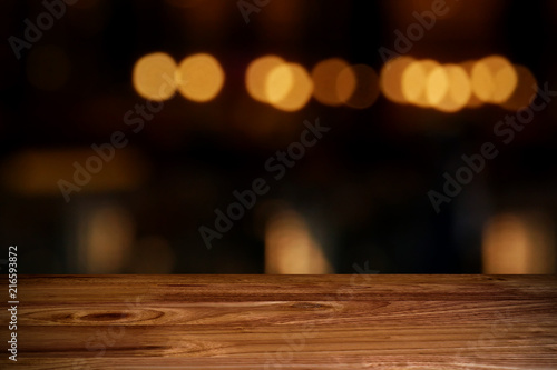 top wood table with Blur Background