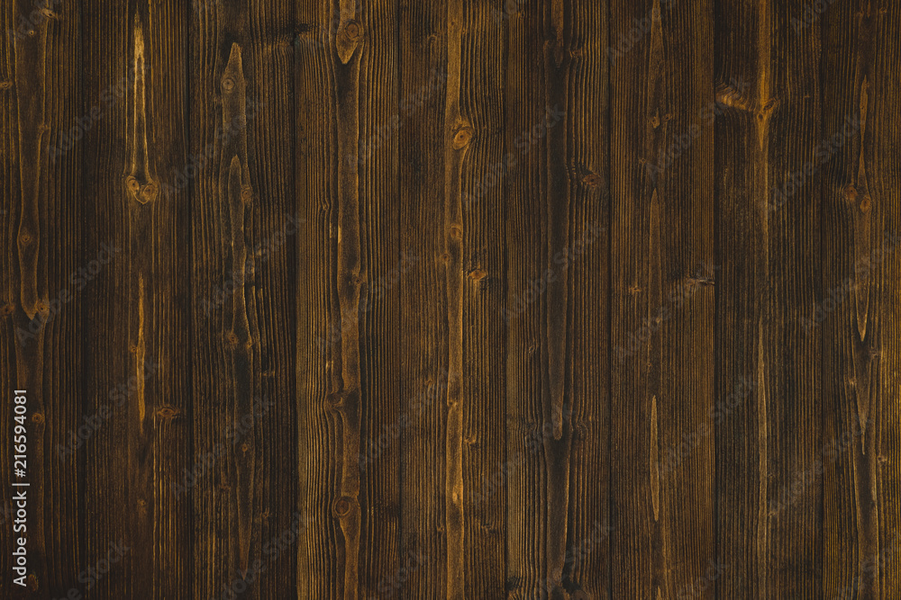 Dark brown wood texture with natural striped pattern background Dark brown wood texture with natural striped pattern background