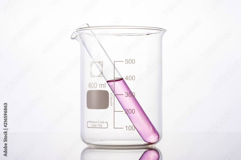 beaker and cylinder closeup isolated white. beaker and cylinder closeup isolated white.