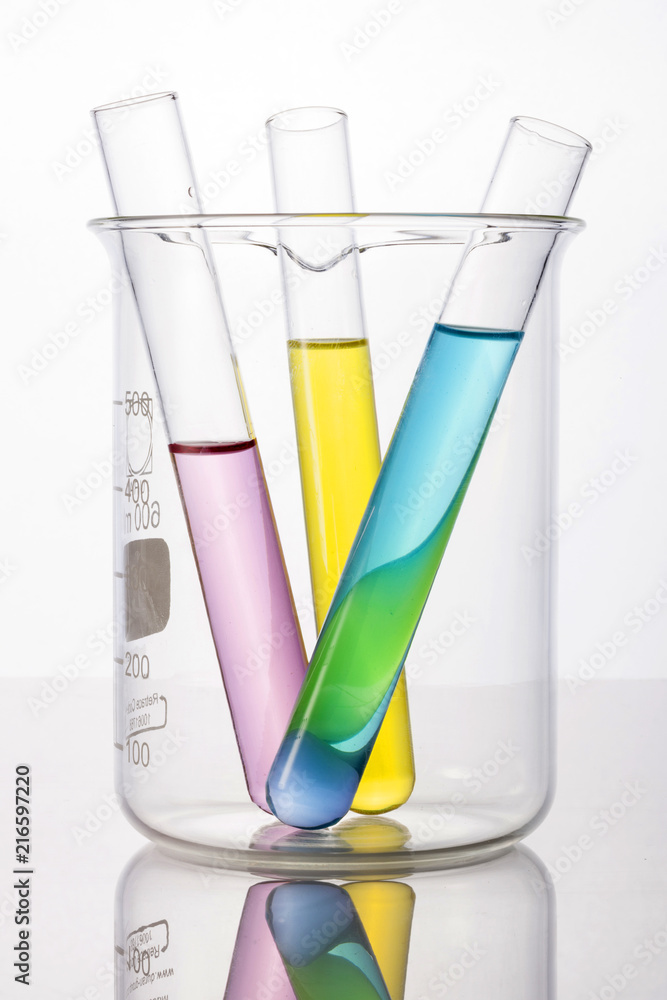 beaker and cylinder closeup isolated white. beaker and cylinder closeup isolated white.