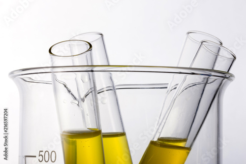 beaker and cylinder closeup isolated white.