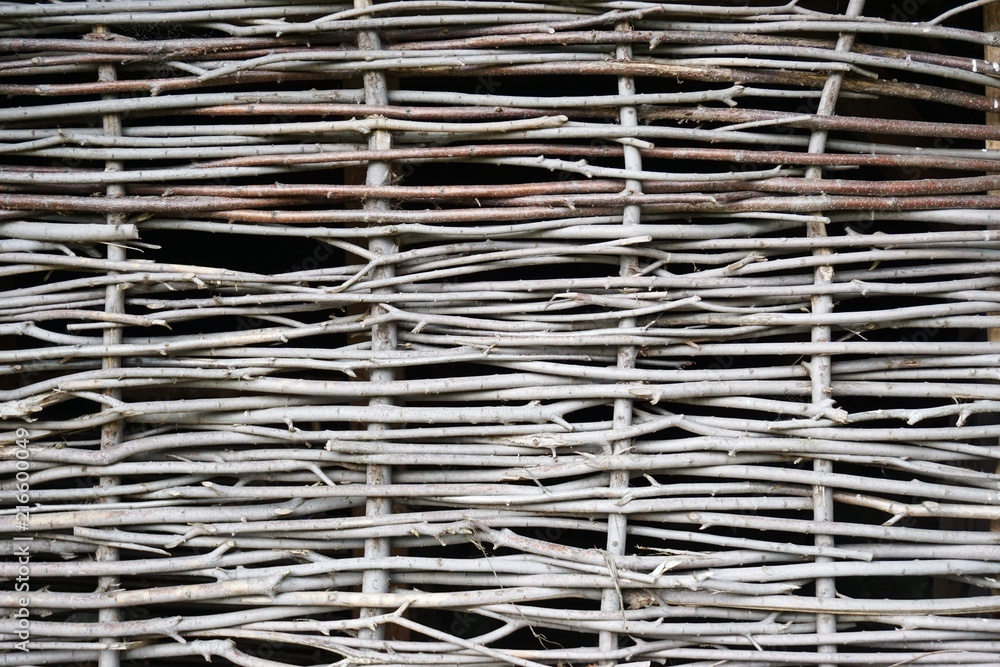 Primitive woven twig wall horizontal background Primitive woven twig wall horizontal background