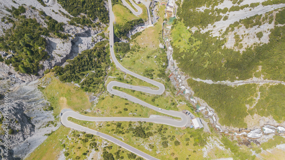 Road to the Stelvio mountain pass in Italy. Up and down amazing aerial view of the mountain bends creating beautiful shapes