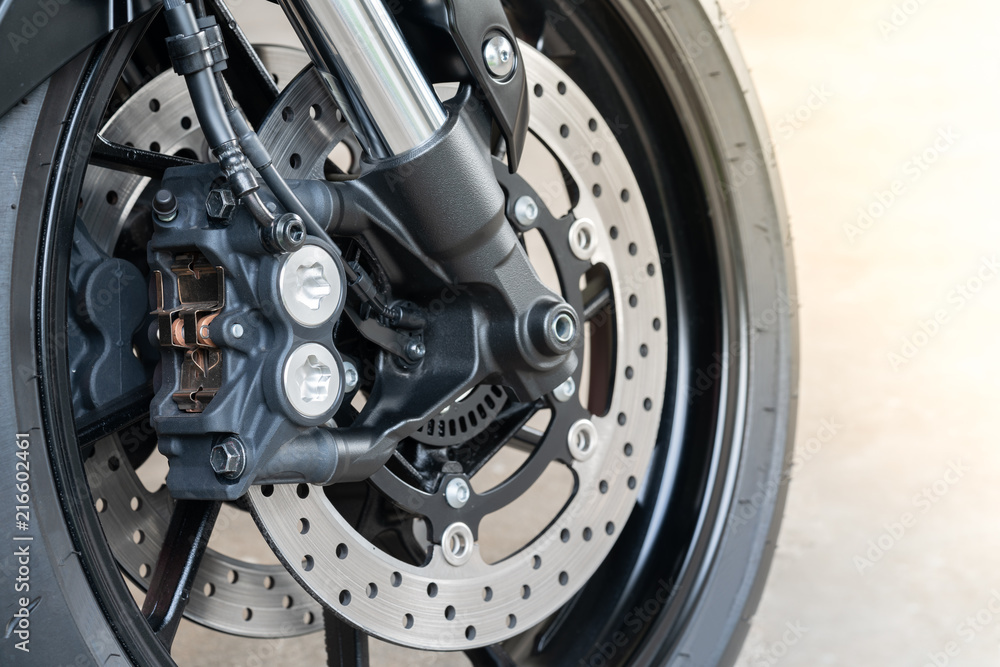 Close up of radial mount caliper on big bike, Motorcycle with Twin Floating Disk Brake and ABS system on a Sport Bike with copy space.