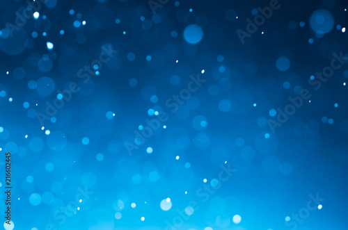 Dark blue abstract backgrounds with bokeh.