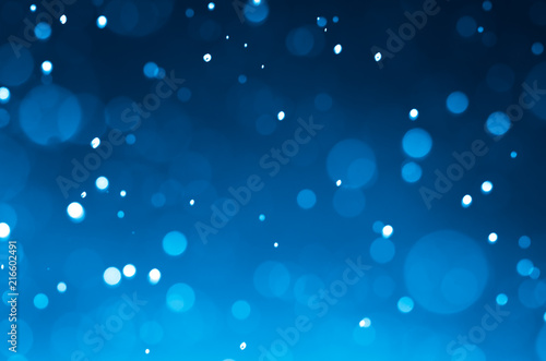 Dark blue abstract backgrounds with bokeh.