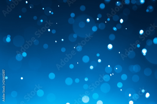 Dark blue abstract backgrounds with bokeh.
