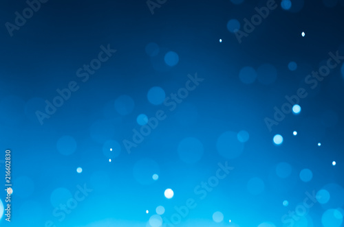 Dark blue abstract backgrounds with bokeh.