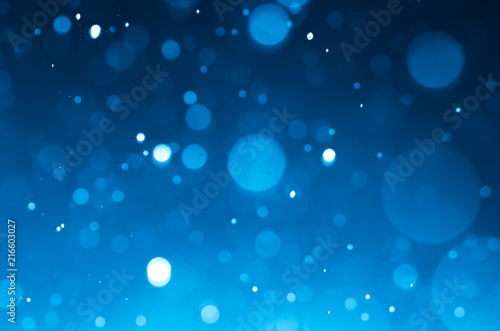 Dark blue abstract backgrounds with bokeh.