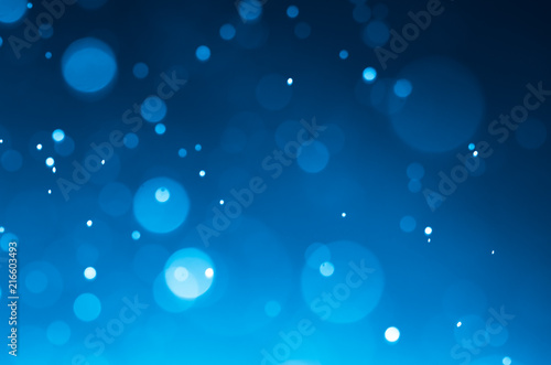 Dark blue abstract backgrounds with bokeh.