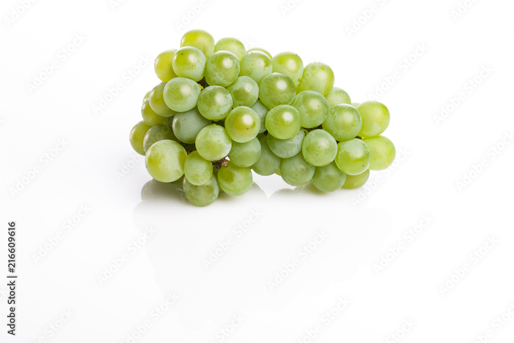 green grapes on the white background.