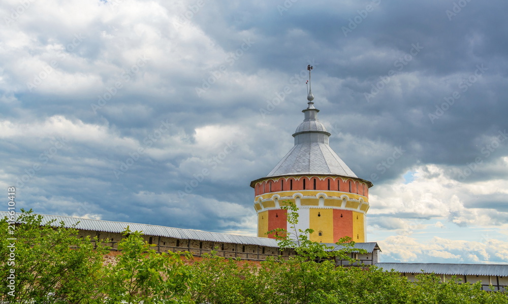 The fortress tower of the Savior-Prilutskiy Dimitriev monastery in Vologda on the background of a cloudy sky