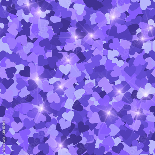 Glitter seamless texture. Actual purple particles. Endless pattern made of sparkling hearts. Ravishi