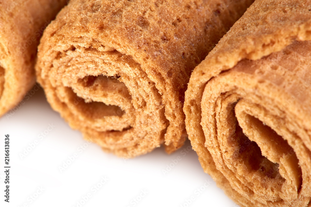 Wafer rolls. Sweet tube wafer isolated on white background. Dessert. Wafer rolls. Sweet tube wafer isolated on white background. Dessert.