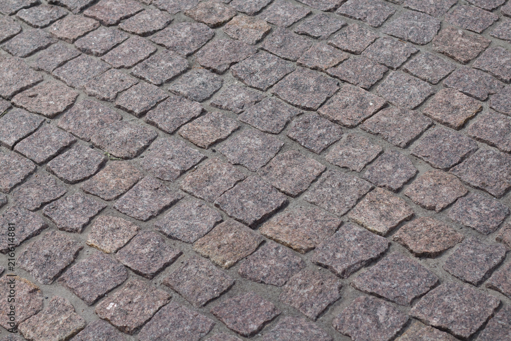 fragment of granite pavers at an angle in different color schemes fragment of granite pavers at an angle in different color schemes
