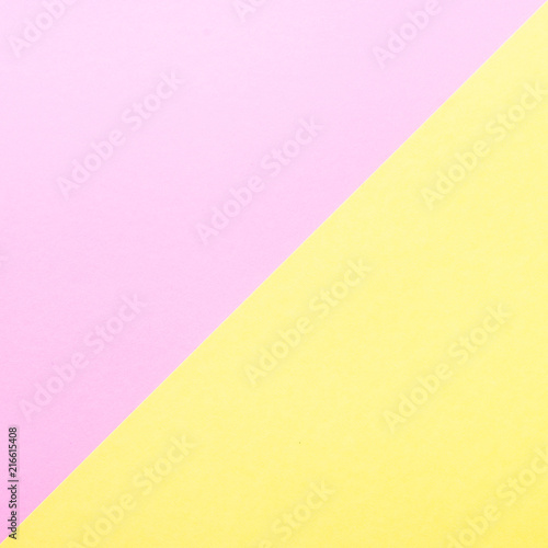 Yellow and pink paper background.