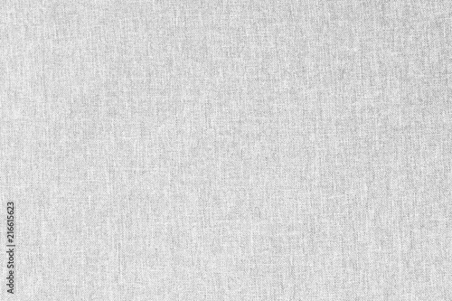 Gray canvas texture for background with visible fibers.
