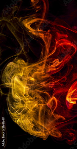 Colored smoke on black background