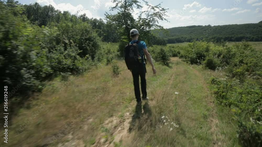 Man with backpack hiking Man with backpack hiking