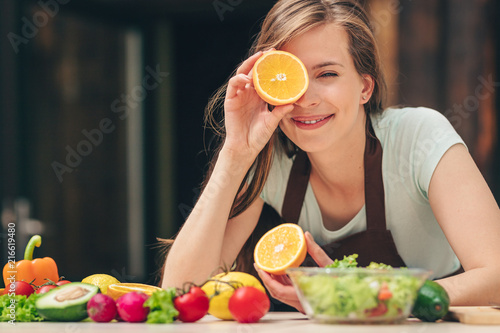 Smiling vegan in the kitchen