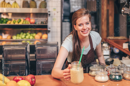 Young chef with smoothies