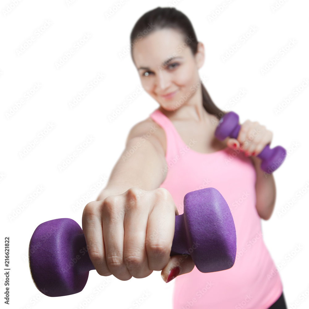 Sporty young woman with dumbbells, isolated on white background Sporty young woman with dumbbells, isolated on white background