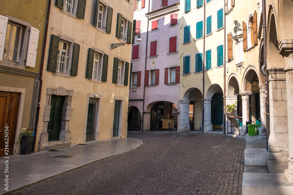 Paolo Sarpi Street, cobblestone alley in the heart of Udine city, Friuli Venezia Giulia region, Italy.