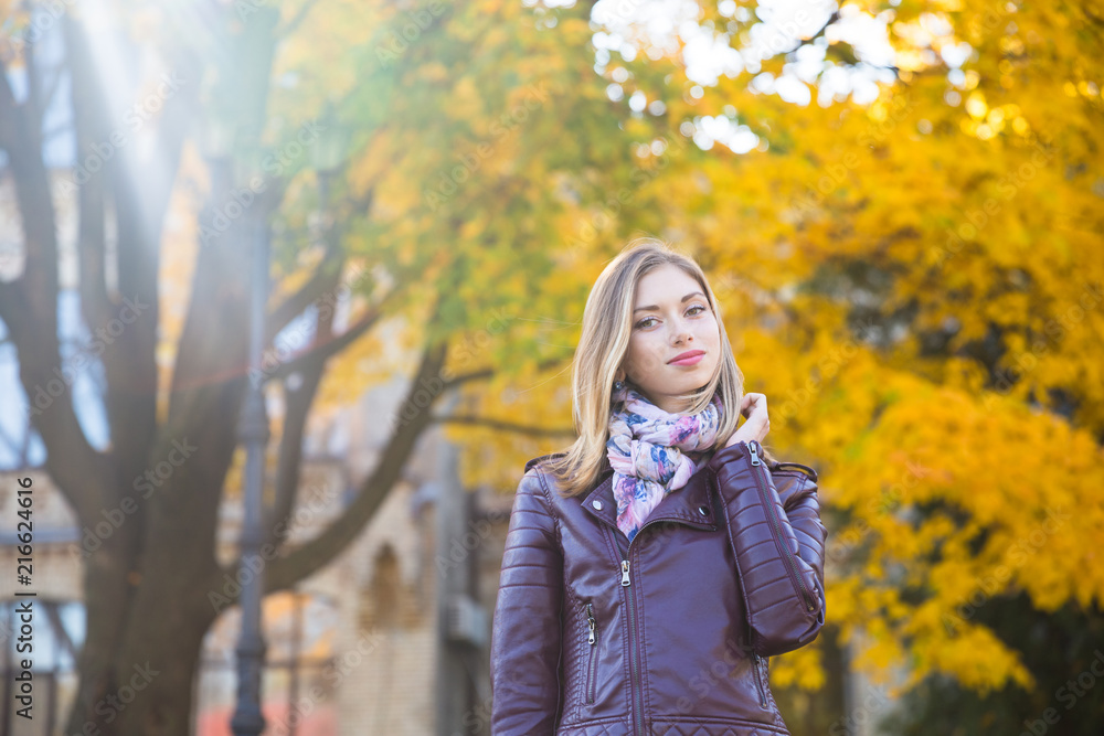 Happy teen girl smile during walking on autumn park Happy teen girl smile during walking on autumn park