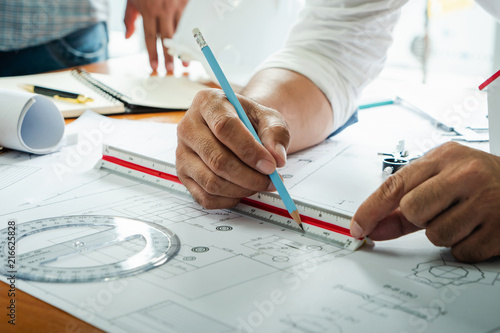 Worker engineer housing plan architect drawing paper of structure.