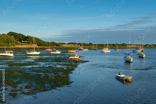 Small boats and dinghies at low tide, near Dell Quay, Chichester Harbour, England, UK.