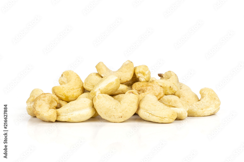 Lot of whole raw cashew nut heap isolated on white background Lot of whole raw cashew nut heap isolated on white background