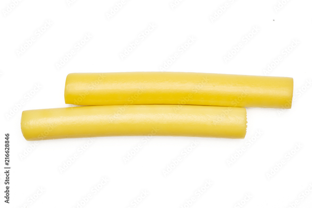 Group of two whole smoked slovak string cheese stick flatlay isolated on white background Group of two whole smoked slovak string cheese stick flatlay isolated on white background