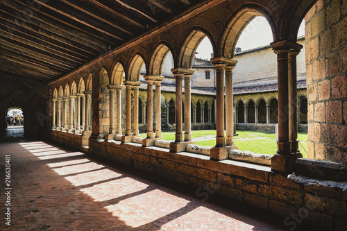 Cloisters around a central courtyard, St Emilion