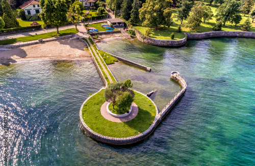 Aerial view of Cerro beach situated near Laveno Mombello, on the shore of Lake Maggiore, Italy photo