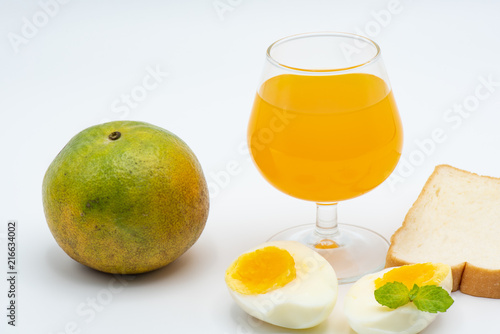 Glass of orange juice with heathy foods