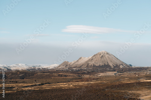Mountains volcano covered with snow under the blue sky in Iceland
