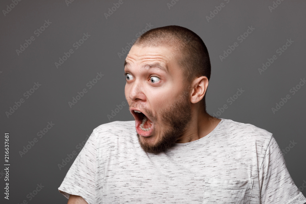 portrait of surprised young man portrait of surprised young man