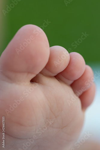 Baby white tiny foot toes detail
