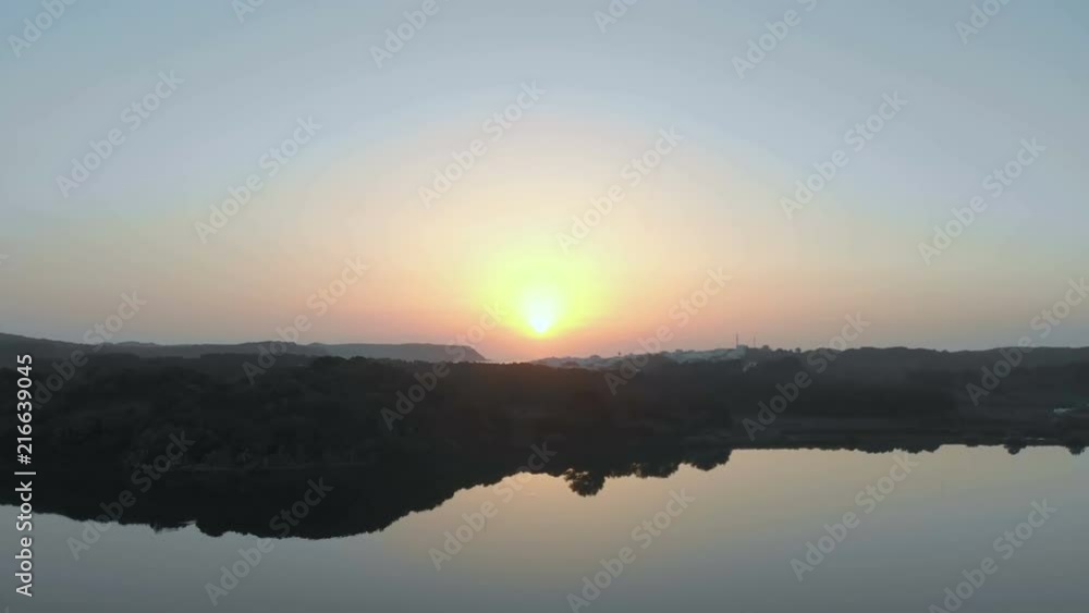 Aerial Drone View of a Lake and Hills at Sunrise in Menorca Aerial Drone View of a Lake and Hills at Sunrise in Menorca