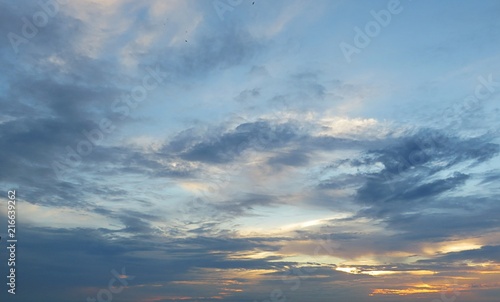 Beautiful blue golden sunset background in the sky