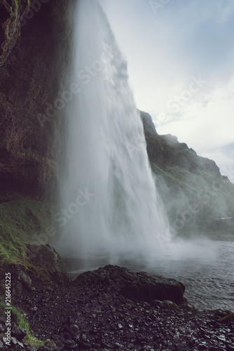 Famous waterfall Seljalandsfoss in Iceland  adventure outdoor travel Icelandic summer background