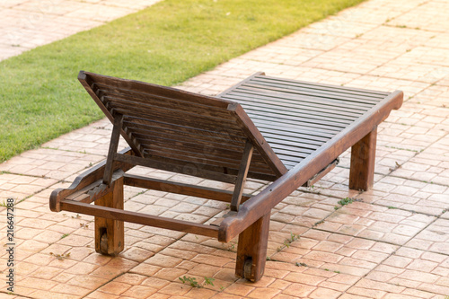 Wooden sun loungers Put on the pitch © wannasak