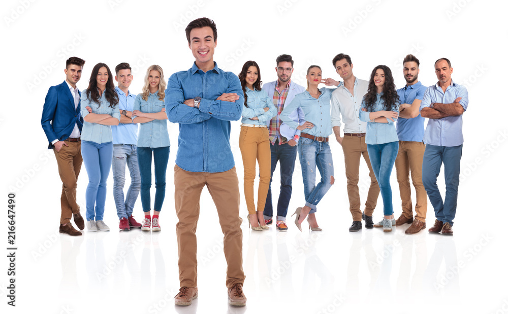 Obraz premium happy and confident team leader in front of his group