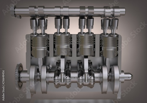 Silver car engine on a gray