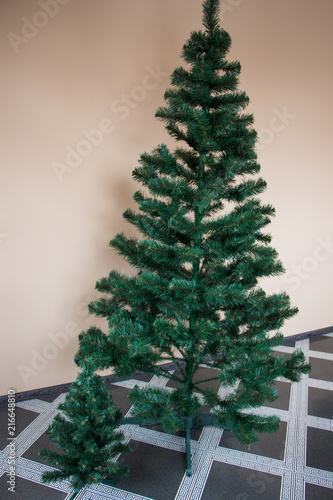 Two artificial pine Christmas tree