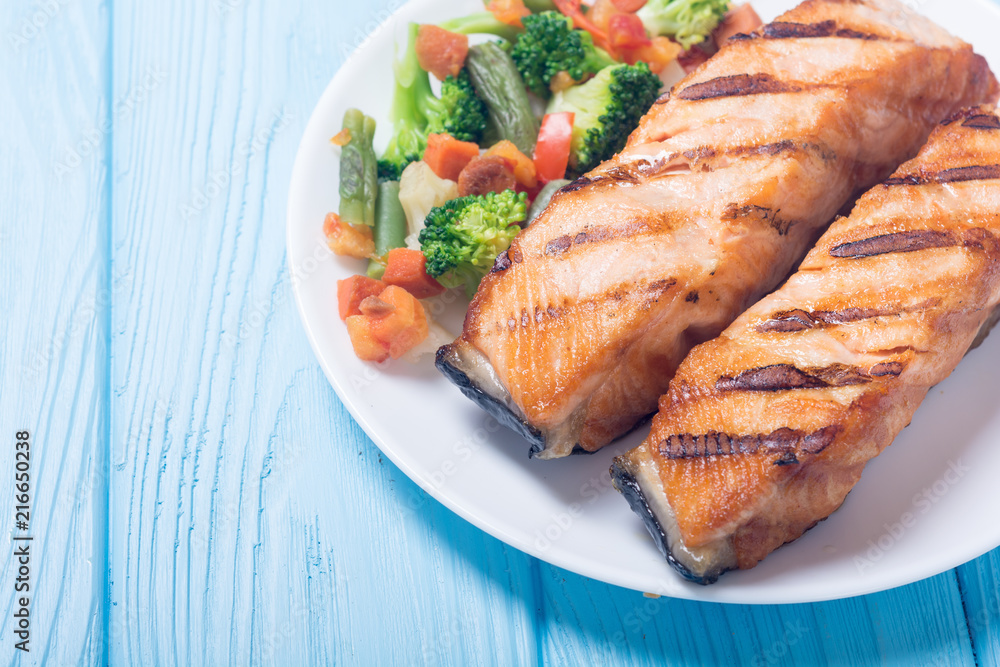 Grilled salmon fish with vegetables
