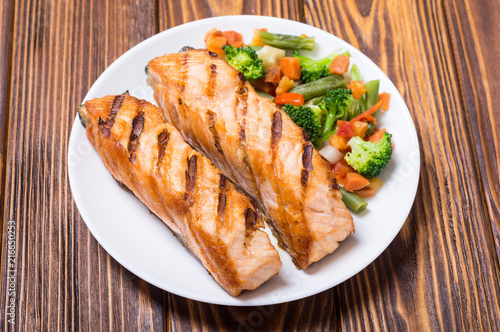Grilled salmon fish with vegetables