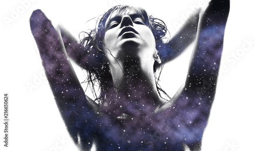 beauty and sensuality concept - double exposure of beautiful seductive woman and purple galaxy over white background