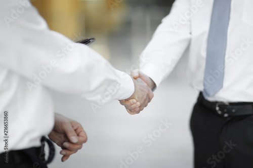 closeup .handshake business people in the office