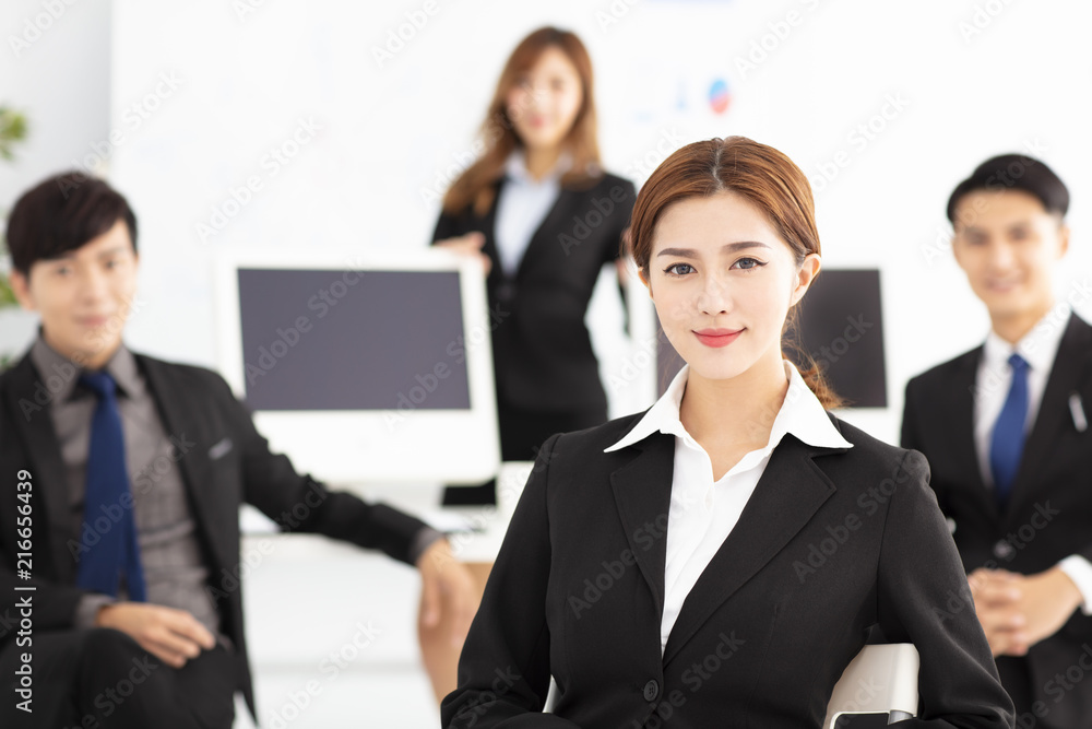 Portrait of successful young business team in office Portrait of successful young business team in office